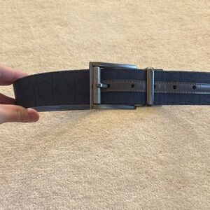 Men's Calvin Klein Black and blue logo reverse belt size medium 34-36